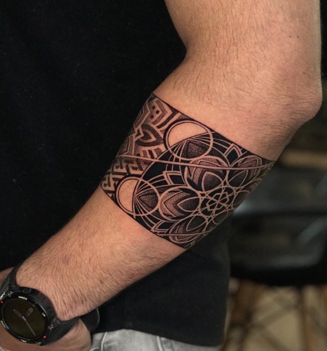 sacred geometry mandala pattern armband tattoo male upper forearm